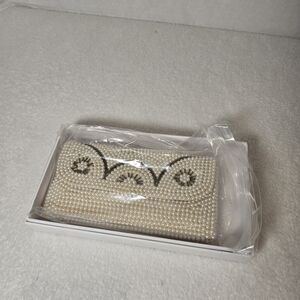 Isaac Mizrahi Pearl Clutch with Black Detailing